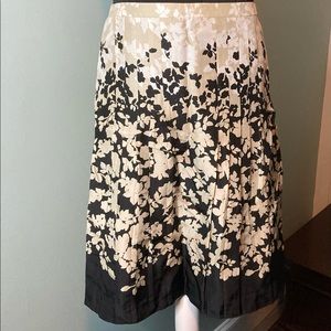 Ann Taylor 
4 Cream/White/Black skirt
100% silk